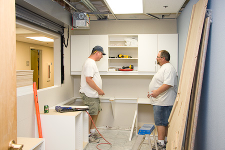 Installing the new Little School office furniture